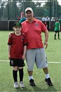 18 June 2023; Bohemians Youths player Grace Flahavan and team coach Vinnie Campion during the Football For All National Blitz on the Sport Ireland Campus in Dublin. Photo by Seb Daly/Sportsfile