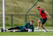 18 June 2023; Goalkeeper Mark Travers and Liam Scales, right, during a Republic of Ireland training session at the FAI National Training Centre in Abbotstown, Dublin. Photo by Stephen McCarthy/Sportsfile