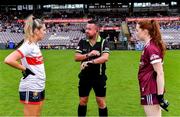 17 June 2023; Referee Séamus Mulvihill with team captains Maire O'Callaghan of Cork and Sarah Ní Loingsigh of Galway before the TG4 All-Ireland Ladies Senior Football Championship Round 1 match between Galway and Cork at Pearse Stadium in Galway. Photo by Piaras Ó Mídheach/Sportsfile