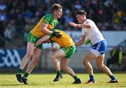 17 June 2023; Jamie Brennan, centre, runs into Donegal teammate Ciaran Thompson during the GAA Football All-Ireland Senior Championship Round 3 match between Monaghan and Donegal at O'Neills Healy Park in Omagh, Tyrone. Photo by Ramsey Cardy/Sportsfile