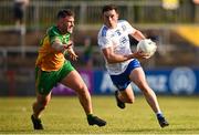 17 June 2023; Shane Carey of Monaghan in action against Patrick McBrearty of Donegal during the GAA Football All-Ireland Senior Championship Round 3 match between Monaghan and Donegal at O'Neills Healy Park in Omagh, Tyrone. Photo by Ramsey Cardy/Sportsfile