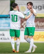 19 June 2023; Conor Carty of Republic of Ireland, right, celebrates with teammate Andrew Morgan after scoring his side's second goal during the International friendly match between the Republic of Ireland U21's and Kuwait U22's at Parktherme Arena in Bad Radkersburg, Austria. Photo by Blaz Weindorfer/Sportsfile