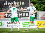 19 June 2023; Ollie O'Neill of Republic of Ireland, right, celebrates with teammate Ed McJannet after scoring his side's first goal during the International friendly match between the Republic of Ireland U21's and Kuwait U22'S at Parktherme Arena in Bad Radkersburg, Austria. Photo by Blaz Weindorfer/Sportsfile