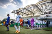 19 June 2023; Republic of Ireland captain Andrew Morgan leads his side out before the International friendly match between the Republic of Ireland U21's and Kuwait U22'S at Parktherme Arena in Bad Radkersburg, Austria. Photo by Blaz Weindorfer/Sportsfile