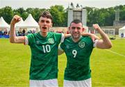 19 June 2023; Goalscorers Team Ireland's Ray Singleton, a member of Eagles Special Olympics Club, from Aughnacloy, Tyrone, left, who scored two goals and James Meenan, a member of Newry City Special Olympics Club, from Dundalk, Louth, who scored the third goal celebrate after the Ireland and Uganda qualifier on day three of the World Special Olympic Games 2023 at The Mayfield in the Olympiapark in Berlin, Germany. Photo by Ray McManus/Sportsfile