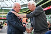 19 June 2023; Former Republic of Ireland international and RTÉ analyst Liam Brady is greeted by Jappa Murphy from Wexford Town during the UEFA EURO 2024 Championship qualifying group B match between Republic of Ireland and Gibraltar at the Aviva Stadium in Dublin. Photo by Stephen McCarthy/Sportsfile