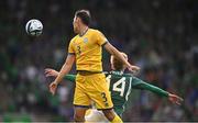 19 June 2023; Nuraly Alip of Kazakhstan in action against Isaac Price of Northern Ireland during the UEFA EURO 2024 Championship Qualifier match between Northern Ireland and Kazakhstan at National Stadium at Windsor Park in Belfast. Photo by Ramsey Cardy/Sportsfile