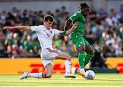 19 June 2023; Michael Obafemi of Republic of Ireland in action against Niels Hartman of Gibraltar during the UEFA EURO 2024 Championship qualifying group B match between Republic of Ireland and Gibraltar at the Aviva Stadium in Dublin. Photo by Stephen Marken/Sportsfile
