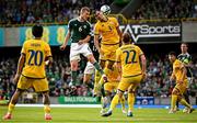 19 June 2023; George Saville of Northern Ireland and Nuraly Alip of Kazakhstan compete for a header during the UEFA EURO 2024 Championship Qualifier match between Northern Ireland and Kazakhstan at National Stadium at Windsor Park in Belfast. Photo by Ramsey Cardy/Sportsfile
