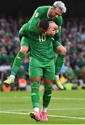 19 June 2023; Adam Idah of Republic of Ireland celebrates with teammate Troy Parrott after scoring his side's third goal during the UEFA EURO 2024 Championship qualifying group B match between Republic of Ireland and Gibraltar at the Aviva Stadium in Dublin. Photo by Seb Daly/Sportsfile