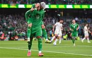 19 June 2023; Adam Idah of Republic of Ireland celebrates with teammate Troy Parrott after scoring his side's third goal during the UEFA EURO 2024 Championship qualifying group B match between Republic of Ireland and Gibraltar at the Aviva Stadium in Dublin. Photo by Seb Daly/Sportsfile