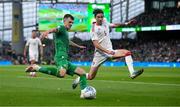 19 June 2023; Jason Knight of Republic of Ireland in action against Louie Annesley of Gibraltar during the UEFA EURO 2024 Championship qualifying group B match between Republic of Ireland and Gibraltar at the Aviva Stadium in Dublin. Photo by Stephen McCarthy/Sportsfile