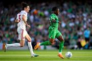 19 June 2023; Michael Obafemi of Republic of Ireland in action against Louie Annesley of Gibraltar during the UEFA EURO 2024 Championship qualifying group B match between Republic of Ireland and Gibraltar at the Aviva Stadium in Dublin. Photo by Seb Daly/Sportsfile