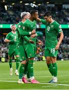 19 June 2023; Adam Idah of Republic of Ireland, centre, celebrates with teammates Jamie McGrath, right, and Troy Parrott after scoring their side's third goal during the UEFA EURO 2024 Championship qualifying group B match between Republic of Ireland and Gibraltar at the Aviva Stadium in Dublin. Photo by Seb Daly/Sportsfile