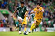 19 June 2023; Shea Charles of Northern Ireland in action against Abzal Beysebekov of Kazakhstan during the UEFA EURO 2024 Championship Qualifier match between Northern Ireland and Kazakhstan at National Stadium at Windsor Park in Belfast. Photo by Ramsey Cardy/Sportsfile