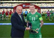 19 June 2023; FAI President Gerry McAnaney makes a presentation to James McClean of Republic of Ireland, on the occasion of his 100th international cap, before the UEFA EURO 2024 Championship qualifying group B match between Republic of Ireland and Gibraltar at the Aviva Stadium in Dublin. Photo by Stephen McCarthy/Sportsfile