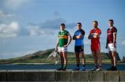 20 June 2023; In attendance at the 2023 GAA Football All-Ireland Series national launch in Howth, Dublin, are from left,  Gavin White of Kerry with the Sam Maguire cup, Cormac Costello of Dublin, Conor Glass of Derry and Matthew Tierney of Galway. Photo by Brendan Moran/Sportsfile