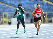 20 June 2023; Israel Olatunde of Ireland, left, and Markus Fuchs of Austria, during the Men's 100m at the Silesian Stadium during the European Games 2023 in Chorzow, Poland. Photo by Tyler Miller/Sportsfile