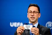 20 June 2023; Head of Club Competitions & Calendar Tobias Hedtstück draws out the card of Shamrock Rovers FC during the UEFA Champions League 2023/24 First Qualifying Round Draw at the UEFA headquarters, in Nyon, Switzerland. Photo by Kristian Skeie - UEFA via Sportsfile