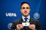 20 June 2023; UEFA Senior Club Competitions Manager Tom Barlow draws out the card of '8' during UEFA Europa Conference League 2023/24 First Qualifying Round Draw at the UEFA headquarters, in Nyon, Switzerland. Photo by Kristian Skeie - UEFA via Sportsfile