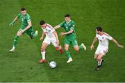 19 June 2023; Tjay De Barr of Gibraltar, supported by teammate Scott Ballantine, right, in action against Alan Browne, 8, and Josh Cullen of Republic of Ireland during the UEFA EURO 2024 Championship qualifying group B match between Republic of Ireland and Gibraltar at the Aviva Stadium in Dublin. Photo by Piaras Ó Mídheach/Sportsfile