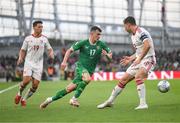 19 June 2023; Jason Knight of Republic of Ireland in action against Jayce Olivero, right, and Tjay De Barr of Gibraltar during the UEFA EURO 2024 Championship qualifying group B match between Republic of Ireland and Gibraltar at the Aviva Stadium in Dublin. Photo by Stephen McCarthy/Sportsfile