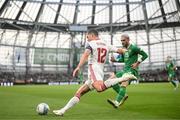 19 June 2023; Jayce Olivero of Gibraltar in action against Troy Parrott of Republic of Ireland during the UEFA EURO 2024 Championship qualifying group B match between Republic of Ireland and Gibraltar at the Aviva Stadium in Dublin. Photo by Stephen McCarthy/Sportsfile
