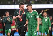 19 June 2023; Jason Knight of Republic of Ireland and Kieran Crowley, FAI communications manager, after the UEFA EURO 2024 Championship qualifying group B match between Republic of Ireland and Gibraltar at the Aviva Stadium in Dublin. Photo by Stephen McCarthy/Sportsfile