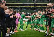 19 June 2023; James McClean of Republic of Ireland is applauded off the pitch, on the occasion of his 100th international cap, by team-mates and staff after the UEFA EURO 2024 Championship qualifying group B match between Republic of Ireland and Gibraltar at the Aviva Stadium in Dublin. Photo by Stephen McCarthy/Sportsfile