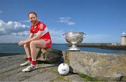 20 June 2023; Conor Glass of Derry poses for a portrait with the Sam Maguire cup at the 2023 GAA Football All-Ireland Series national launch in Howth, Dublin. Photo by Brendan Moran/Sportsfile