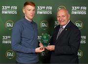 20 June 2023; Rory Gaffney of Shamrock Rovers is presented with the SSE Airtricity League Player of the Year by FAI President Gerry McAnaney during the FAI 33rd International Awards at Mansion House in Dublin. Photo by Stephen McCarthy/Sportsfile