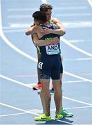 20 June 2023; Finley Daly of Ireland, right, and Nahuel Carabaña of Andorra embrace after the Men's 3000m Steeplechase at the Silesian Stadium during the European Games 2023 in Chorzow, Poland. Photo by Tyler Miller/Sportsfile