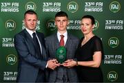 20 June 2023; Men’s U16 Player of the Year Matthew Moore with Kate and David Moore during the FAI 33rd International Awards at Mansion House in Dublin. Photo by Stephen McCarthy/Sportsfile