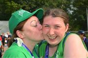 21 June 2023; Team Ireland's Emma Costello, a member of Navan Special Olympics Club, from Clonee, Dublin, with her mother Siobhán after competing in the Long Jump qualifying round on day five of the World Special Olympic Games 2023 at the Hanns-Braun-Stadion, in the Olympiapark, Berlin, Germany.  Photo by Ray McManus/Sportsfile