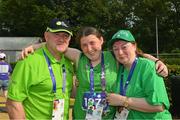 21 June 2023; Team Ireland's Emma Costello, a member of Navan Special Olympics Club, from Clonee, Dublin, with her mother Siobhán and dad John after competing in the Long Jump qualifying round on day five of the World Special Olympic Games 2023 at the Hanns-Braun-Stadion, in the Olympiapark, Berlin, Germany.  Photo by Ray McManus/Sportsfile