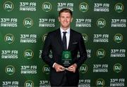 20 June 2023; Nathan Collins with his Men’s Senior Player of the Year award during the FAI 33rd International Awards media event at Mansion House in Dublin. Photo by Stephen McCarthy/Sportsfile