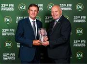 20 June 2023; Kevin Moran is presented with the Hall of Fame award by FAI President Gerry McAnaney during the FAI 33rd International Awards media event at Mansion House in Dublin. Photo by Stephen McCarthy/Sportsfile