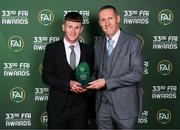 20 June 2023; Peter Grogan of St. Mary’s CBS, Carlow, is presented with the Men’s Schools Player of the Year award by Republic of Ireland Schools Head Coach John McShane during the FAI 33rd International Awards media event at Mansion House in Dublin. Photo by Stephen McCarthy/Sportsfile