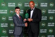 20 June 2023; Matthew Moore is presented with the Men’s U16 Player of the Year award by Republic of Ireland U16 head coach Paul Osam during the FAI 33rd International Awards media event at Mansion House in Dublin. Photo by Stephen McCarthy/Sportsfile