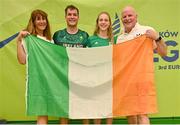 22 June 2023; Sam McKibbin of Ireland, second from left, poses for a photograph with his mother Heather, sister Ellie, and father Uel, after his victory in the men's double Padel qualification round match between Ireland and Albania during the European Games at the KSOS in Krakow. Photo by Tyler Miller/Sportsfile