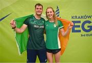22 June 2023; Sam McKibbin of Ireland and his sister Ellie pose for a photograph with the tricolour after his victory in the men's double Padel qualification round match between Ireland and Albania during the European Games at the KSOS in Krakow. Photo by Tyler Miller/Sportsfile
