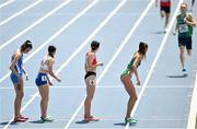 22 June 2023; Sharlene Mawdsley of Ireland, right, awaits the baton from Callum Baird in action in the 4x400 mixed relay at the Silesian Stadium during the European Games 2023 in Chorzow, Poland. Photo by David Fitzgerald/Sportsfile