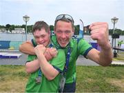 22 June 2023; Team Ireland's head coach Declan O'Connell with Cian Kelleher, a member of Mallow United Special Olympics Club, from Mallow, Cork, after he was presented with a Silver Medal after the KT-1200m Men F03 event at the Kayaking Finals on day six of the World Special Olympic Games 2023 at the Grünau regatta course in Berlin, Germany. Photo by Ray McManus/Sportsfile