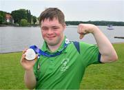 22 June 2023; Team Ireland's Cian Kelleher, a member of Mallow United Special Olympics Club, from Mallow, Cork, after he was presented with a Silver Medal after the KT-1200m Men F03 event at the Kayaking Finals on day six of the World Special Olympic Games 2023 at the Grünau regatta course in Berlin, Germany. Photo by Ray McManus/Sportsfile