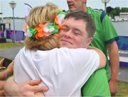 22 June 2023; Team Ireland's Cian Kelleher, a member of Mallow United Special Olympics Club, from Mallow, Cork, with Claire O'Keane after he was presented with a Silver Medal after the KT-1200m Men F03 event at the Kayaking Finals on day six of the World Special Olympic Games 2023 at the Grünau regatta course in Berlin, Germany. Photo by Ray McManus/Sportsfile