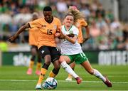 22 June 2023; Agness Musesa of Zambia in action against Leanne Kiernan of Republic of Ireland during the women's international friendly match between Republic of Ireland and Zambia at Tallaght Stadium in Dublin. Photo by Stephen McCarthy/Sportsfile