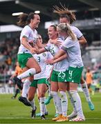 22 June 2023; Claire O'Riordan of Republic of Ireland, centre, celebrates with teammates, Ciara Grant and Louise Quinn after scoring her side's second goal during the women's international friendly match between Republic of Ireland and Zambia at Tallaght Stadium in Dublin. Photo by Stephen McCarthy/Sportsfile