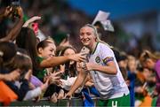 22 June 2023; Louise Quinn of Republic of Ireland takes selfies with supporters after the women's international friendly match between Republic of Ireland and Zambia at Tallaght Stadium in Dublin. Photo by Brendan Moran/Sportsfile