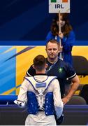 23 June 2023; Jack Woolley of Ireland speaks to coach Robert Taaffe before the Taekwando Men's 58kg round of 16 match at the Krynica-Zdrój Arena during the European Games 2023 in Poland. Photo by David Fitzgerald/Sportsfile