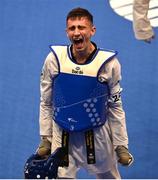 23 June 2023; Jack Woolley of Ireland celebrates after winning his Taekwando Men's 58kg semi final match against Matias Lomartire of Italy at the Krynica-Zdrój Arena during the European Games 2023 in Poland. Photo by David Fitzgerald/Sportsfile